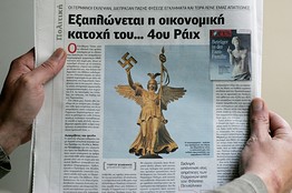 A Greek depiction of the Berlin statue of the goddess Victoria, shown holding a swastika <font face=Arial size=-2>(Source: Eleftheros Typos / WSJ)</font>