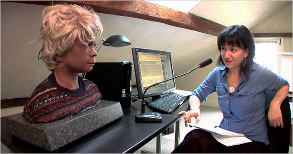 The robot Bina48 chats with reporter Amy Harmon <font size=-2>(Source: NY Times)</font>