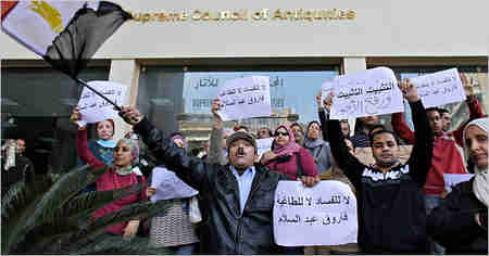Striking museum workers in Cairo on Wednesday (AP)