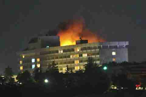 Smoke and flames from a fire at the Kabul Intercontinental Hotel (AFP)