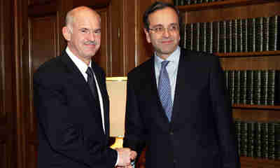 Socialist party leader George Papandreou and conservative New Democracy party leader Antonis Samaras were college roommates, but are now bitter political enemies (EPA)
