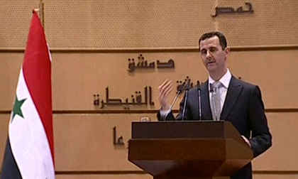 Assad giving speech on Tuesday (AP)