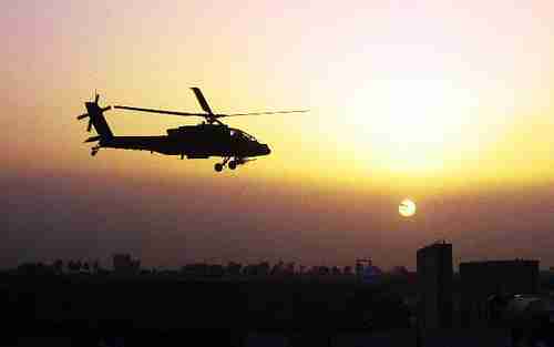 An Apache helicopter flying over Iraq in 2008 (Army)
