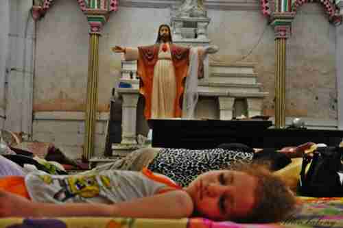 Christians forced out of the town of Mosul by ISIS take shelter in a church. (Aleteia)