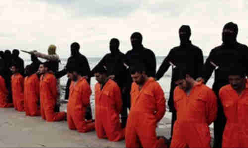 Screen grab from terrorist recruiting and public relations video showing Egyptian Coptic Christian fishermen just prior to beheading