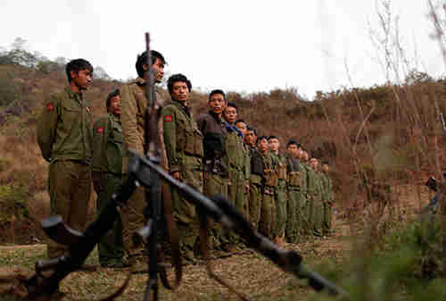 Rebel soldiers of Myanmar National Democratic Alliance Army (MNDAA) gather at a military base in Kokang region in March (Reuters)