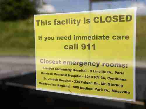 Sign announcing the closure of Kentucky's Nicholas County Hospital because of Obamacare-related bankruptcy (USA Today)