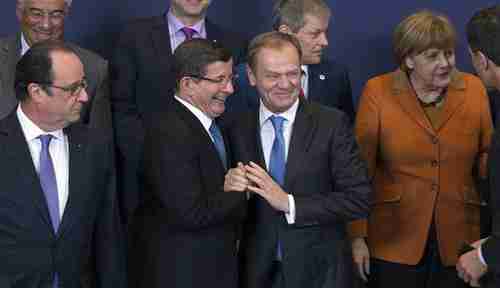 Gleeful European and Turkish leaders at Brussels meeting (Reuters)