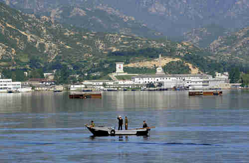 Cruise ship prepares to dock at the port in the Kumgang Mountain Resort in North Korea (AFP)