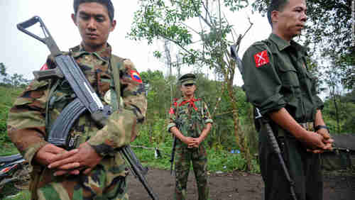 Kachin soldiers in Burma praying