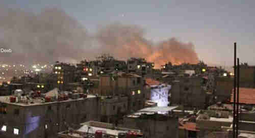 Huge explosions could be seen above the buildings of Damascus