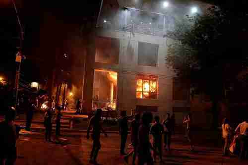 Protesters setting fire to Paraguay's National Congress building in Asunción on Friday night (Reuters)