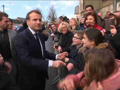 Emmanuel Macro was warmly received by residents of Calais on Tuesday (Sky News)