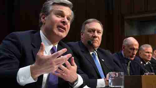  FBI Director Christopher Wray (L) and CIA Director Mike Pompeo (2nd L) testify to a Senate Intelligence Committee on Feb 13, advising Americans not to buy products from Chinese firms Huawei and ZTE (AFP)