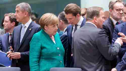 Angela Merkel speaks with other country leaders at EU Summit on Thursday and Friday (Getty)