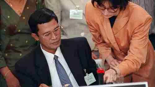 Prime minister Hun Sen signs Paris Peace Accords for Cambodia in 1991; last year he declared the accords to be dead 'ghosts' (AFP)