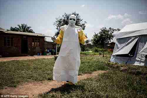 A health worker gets ready to perform Ebola medical checks in North Kivu (AFP)