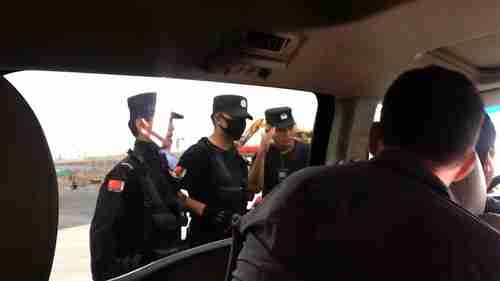 Car with BBC reporters stopped by Chinese police in Xinjiang in October (BBC)