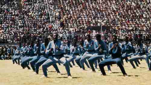 The Norea Korea-trained Fifth Brigade of Mugabe's Zimbabwean army demonstrates karate in May 1984 at Rufaro Statium in Harare, Zimbabwe.  In 1983, the Fifth Brigade committed a massive slaughter of the Ndebele tribe in a massive genocide called Operation Gukurahundi
