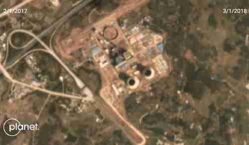 Satellite image of coal-fired power plant in Guangdong province, China.  The two cooling towers are clearly visible.  (Planet Labs)