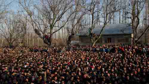 Kashmiris turn out for funeral of the civilians killed on Saturday (AP)
