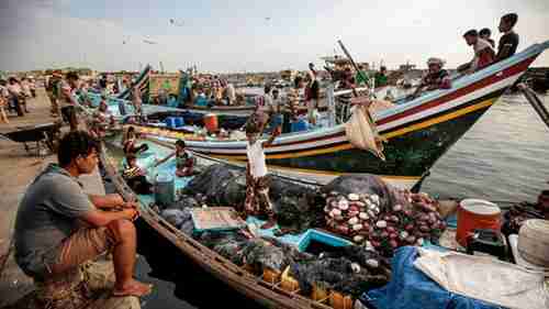 Fishermen in the the seaport of Hodeidah on September 29 (AP)