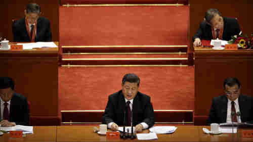 Xi Jinping gives his speech to the Great Hall of the People on December 18 (AP)