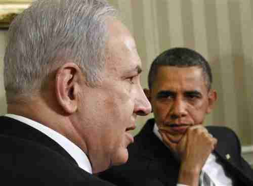 President Obama glares furiously after Benjamin Netanyahu rejects Obama's peace plan and 'lectures' Obama on the reason - in this iconic photo taken at an Oval Office meeting on May 20, 2011 (Reuters)