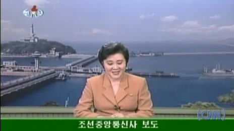 Smiling North Korean news anchor announces successful nuclear weapons test in a gleeful, happy voice in October, 2006 <font size=-2>(Source: CNN)</font>
