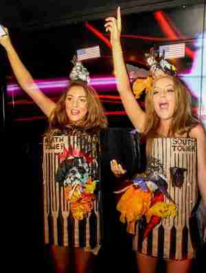 Girls wearing burning Twin Towers costumes