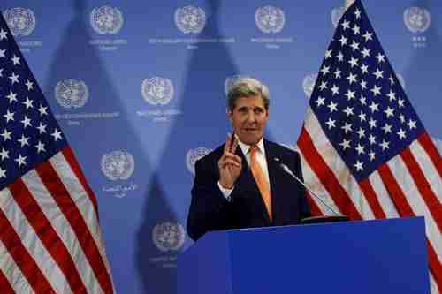 Vietnam anti-American antiwar protester John Kerry gives the 1960s 'peace sign' at a United Nations news conference in Vienna last week (Reuters)
