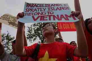 Anti-China protesters in front of the Chinese embassy in Hanoi (AFP)