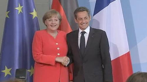 Angela Merkel and Nicolas Sarkozy after Friday's meeting in Berlin