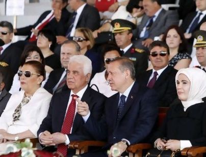 Erdogan and his wife Emine (the only woman wearing a headscarf) in Nicosia, marking the 37th anniversary of Turkish invasion of Cyprus