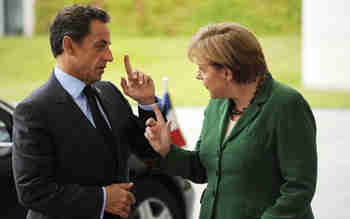 Nicolas Sarkozy and Angela Merkel during negotiations (AFP)