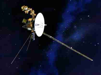A Voyager spacecraft aims its antenna toward Earth