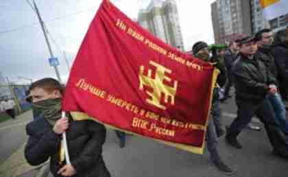 Masked 'Russian March' protesters in Moscow last month