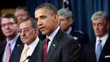 Defense Secretary Leon Panetta to the right of a gaunt President Obama announcing defense budget cuts on Thursday (AP)