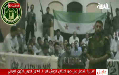 Syrian rebels holding kidnapped Iranians in Damascus, shown in screen grab (Al-Arabiya)