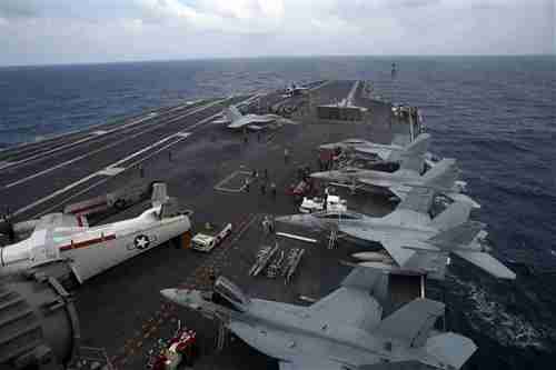 USS George Washington nuclear powered aircraft carrier in South China Sea on Saturday (AP)
