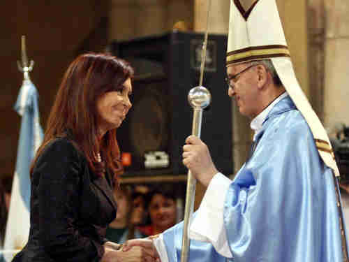Kirchner and Bergoglio shake hands in this 2008 photo.  (AP)