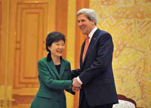 South Korean President Park Geun-Hye shakes hands with John Kerry on Friday (Reuters)