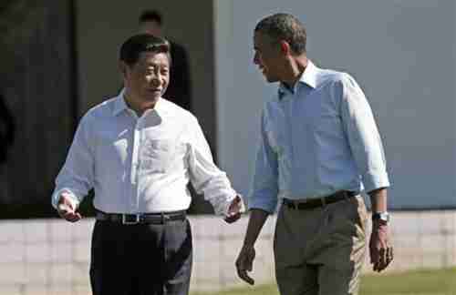 Xi and Obama having informal shirtsleeve discussions (Reuters)