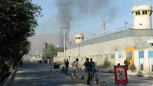 Smoke rises from entrance to presidential palace in Kabul on Tuesday (BBC)