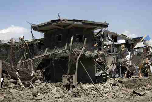 Ruins of Nato supply building in Kabul on Tuesday (AP)