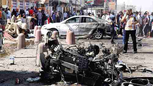 Car wreckage in Sadr City on Wednesday