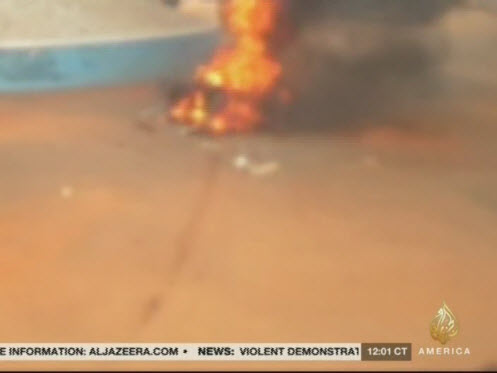 Body burning, after being hacked to pieces on Sunday morning (Al-Jazeera)#