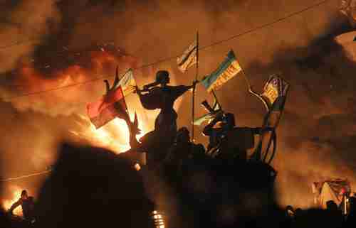 Monuments to Kiev's founders burn on Tuesday (AP)