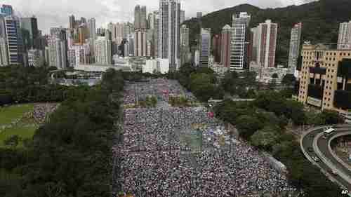 On 1 July tens of thousands marched against candidate restrictions in the territory.  Tens of thousands held pro-Beijing rallies on August 17. (AP)