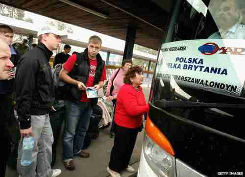 Polish jobseekers boarding buses to the UK (Getty)